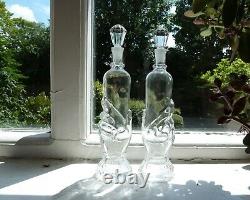 2 Antique Figural Glass Bottles, Base Shaped as a Hand, h23,5cm