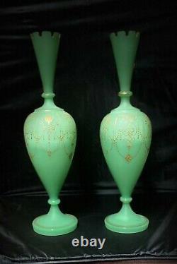 Paired, translucent, cylinder shaped, gilded green opaline glass vases